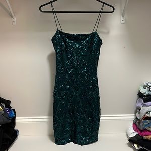 Worn once mini homecoming dress, the color is more turquoise